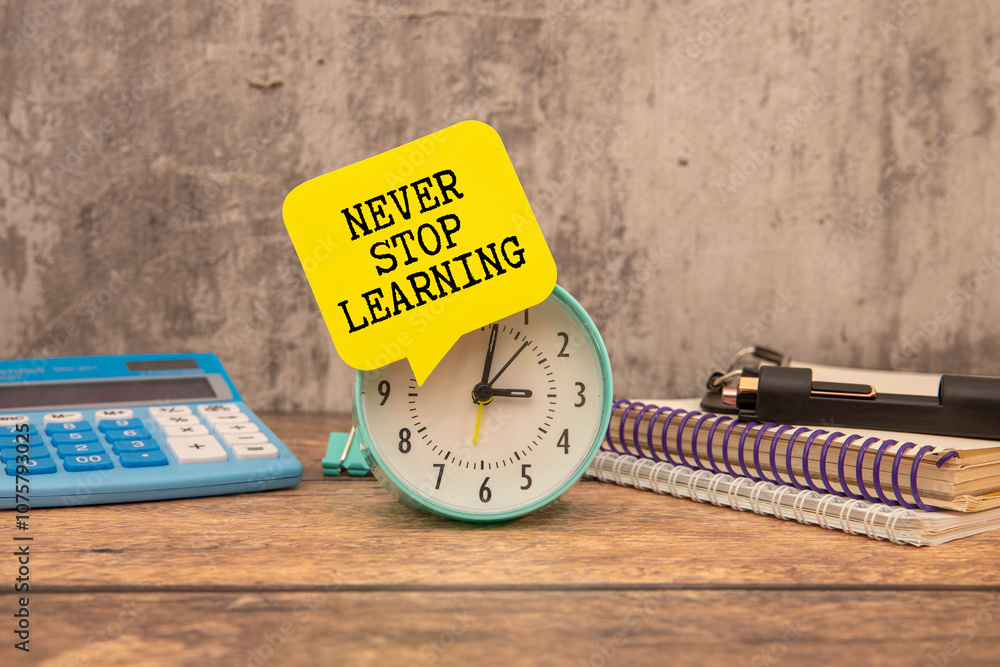 Fototapete notebook page with text never stop learning
