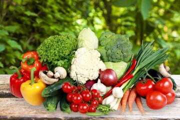 Tasty fresh ripe vegetables and fruits on the desk