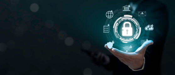 Businessman use smartphone and hold virtual screen Cyber security system. Data Protection...