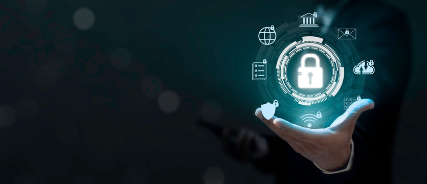 Businessman use smartphone and hold virtual screen Cyber security system. Data Protection Information privacy antivirus virus defence internet technology concept.