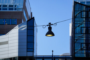 A hanging street lamp in city