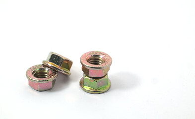 Front view of 4 flange nuts on white background. Part for mechanical or wood work.