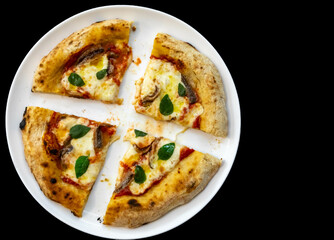 Anchovy pizza isolated on black background top view