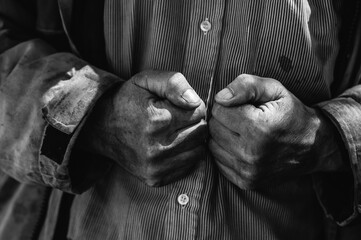 Close up of Caucasian mechanic's dirty hands