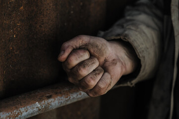 Dirty hands of a worker. Farmer's hands are hardworking close-up