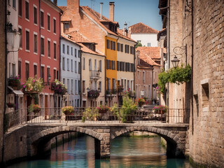 canal stone pedestrian bridge with flowers in old European city