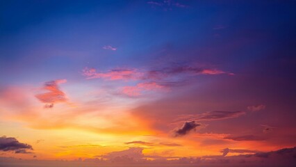 Fototapeta premium Dramatic sunset with vivid twilight colors and a sky filled with clouds 