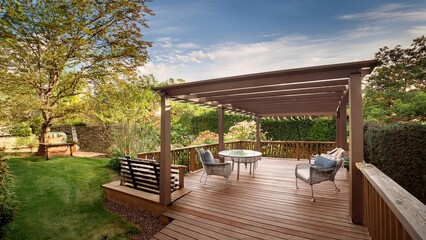 Fototapeta premium Walkout deck with attached pergola in backyard landscape, perfect for relaxing outdoor living 