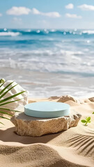 A round pedestal on a beach with palm trees in the background
