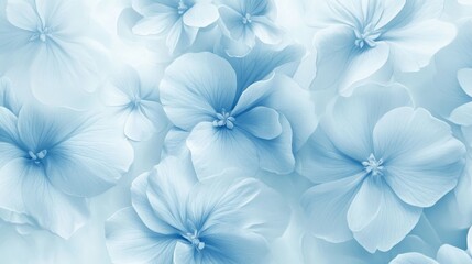 Fototapeta premium A seamless floral pattern in a gradient of blue hues, featuring