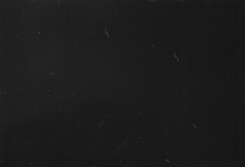 Abstract dirty or aging film. Dust particle and grain texture or dirt use for overlay film frame effect. Dust scratches effect for vintage film grunge textured effect design.