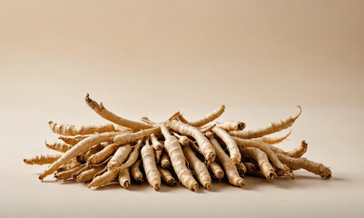 A bunch of dried up plant stems are piled on top of each other