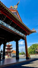 Fototapeta premium Entrance to an unusually beautiful temple - Satya Dharma Temple - the pearl of Buddhist culture on the island of Bali