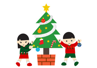 クリスマスツリーの飾り付けをする男の子と女の子