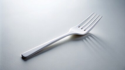 Hyperrealistic 4K Portrait Photography of a White Plastic Fork on a Crisp White Background for Minimalist and Culinary Stock Imagery