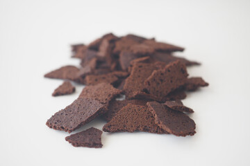 Deliciously Crispy Chocolate Bark Fragments Set Against a Clean White Background
