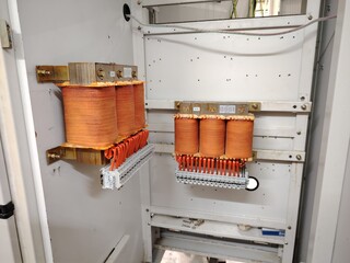 Copper type autotransformer mount in the electrical cabinet.