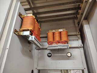 Copper type autotransformer mount in the electrical cabinet.