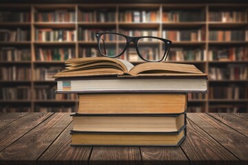 Reading Books set on wooden table in library