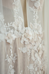 beaded and ruffled floral lace on wedding gown