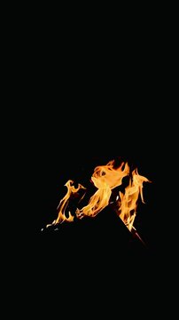 fire blazing in the dark of night