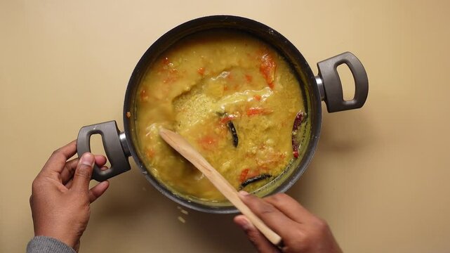  cooking dhal in a large pan 