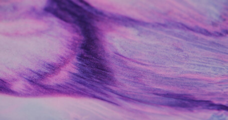 Purple wave. Pink mixture. Opaque paint with sparkling powder dissolving dye pigment. Spread of...