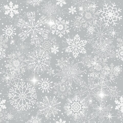 Vector hand drawn seamless winter pattern with lace doodle snowflakes on a gray background