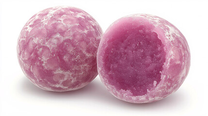 Two pink spherical candies showcasing a textured exterior, one cut in half revealing a bright, glossy interior.