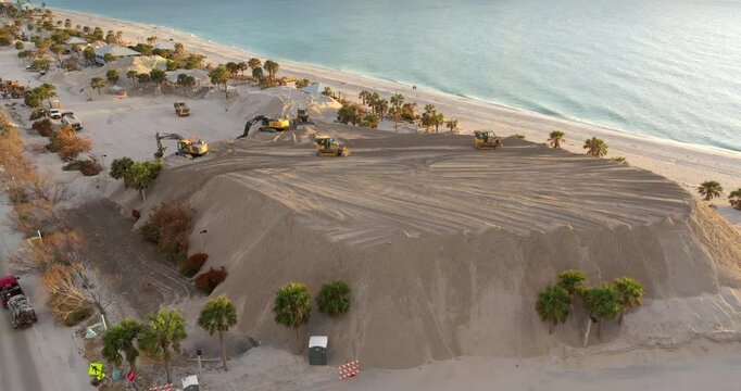Hurricane Milton aftermath cleanup. Piles of sand at Charlotte County sand recipient site at Englewood Beach on Manasota Key