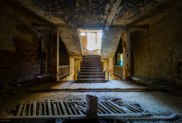 broken staircase in a building of decay