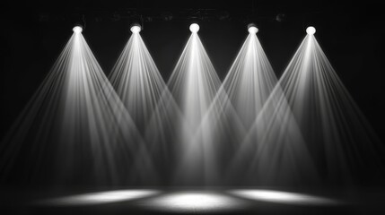 Array of professional stage spotlights in a concert setting, with beams of various widths and angles creating intricate patterns on a dark background.