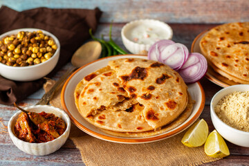 Sattu paratha, a stuffed flatbread from Uttar Pradesh and Bihar, is filled with spiced roasted gram...