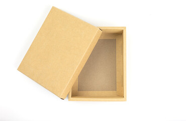 Top view, open kraft gift box isolated on a white background. Gift box concept for happy birthday, thank you, congratulation, mother's day, anniversary, Valentine's day, and holiday..