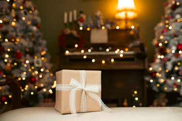 Christmas presents on the backdrop of a festive Christmas tree with festive lights
