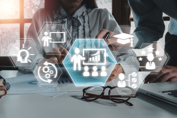 Futuristic digital interface showcasing training and development concepts with business icons and...