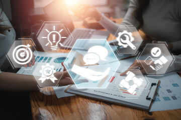Visual representation of advice and strategy with digital icons overlaying a business meeting setting.