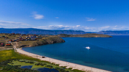 flying over the village of Sakhyurt on the shore of Lake Baikal near the island of Olkhon