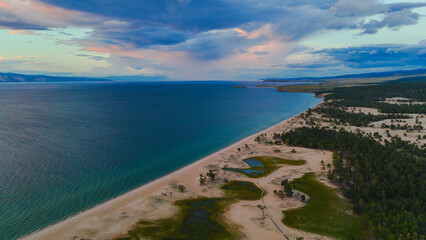 flying over the shore of Lake Baikal on Olkhon island at dawn