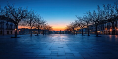 A serene urban landscape at dawn with bare trees and a tranquil atmosphere.