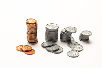 US coin ascending like a bar graph isolated on white table