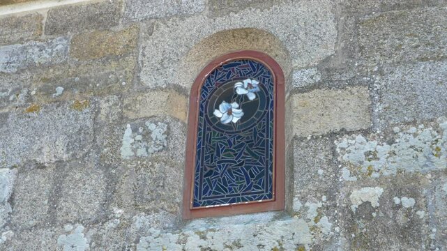 Detail of stone window at Santa Mar&iacute;a de Parada de Outeiro church in Vilar de Santos, Spain