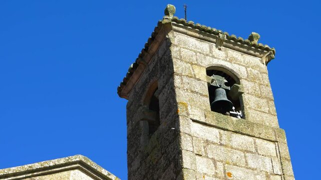 Bell tower of Santa Mar&iacute;a de Parada de Outeiro church in Vilar de Santos, Ourense, Galicia, Spain