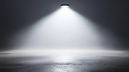 Obraz premium Dramatic Light Beam Illuminating Wet Floor in Dark Environment, Creating Mood of Mystery and Depth in Cinematic Style for Use in Creative Projects