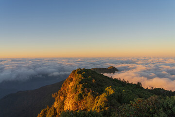 Beautiful morning landscape of mountains with low-level clouds in the Himalayas.