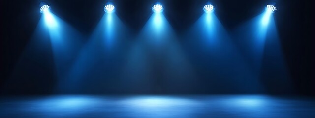 Blue Stage Lights Shining In Darkened Environment.