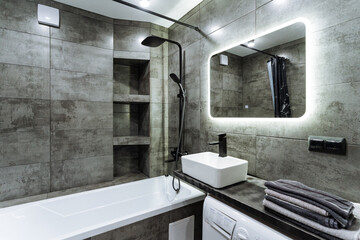 Explore a modern bathroom interior that features stylish fixtures, elegant designs, and contemporary elements for a luxurious experience