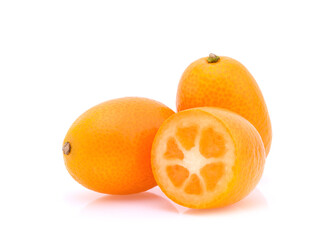 Cumquat or kumquat with half isolated on white background