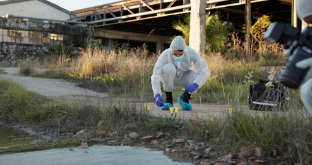 Crime scene, people and outdoor with equipment for forensics, evidence and investigation. Team,...