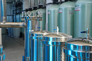 Metal tanks for the preparation of bottled filtered water at the plant.